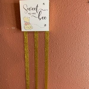 Winnie the Pooh bow holder.